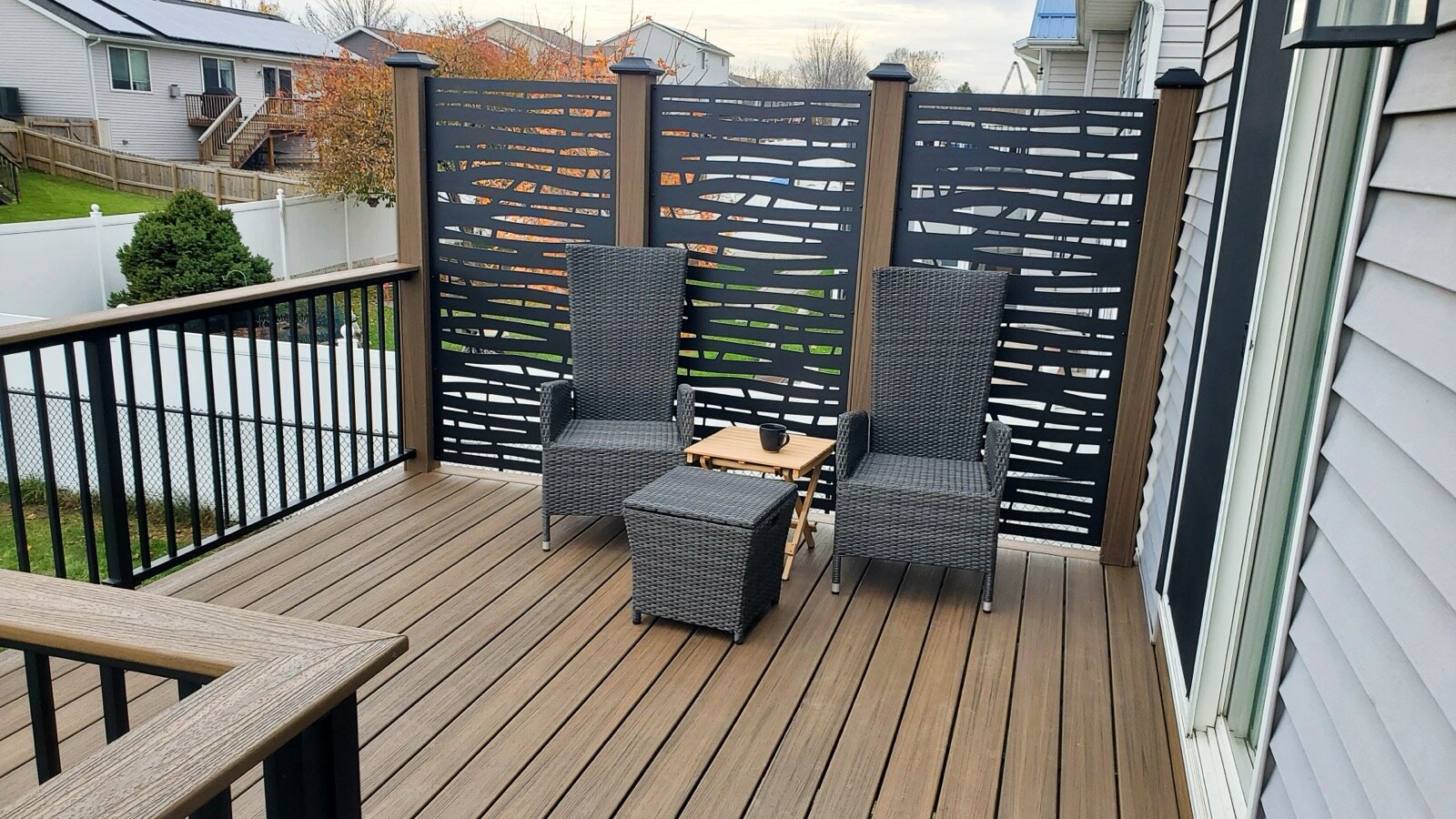 Composite Deck with Privacy Fence by T&T Home Improvement in Cedar Rapids