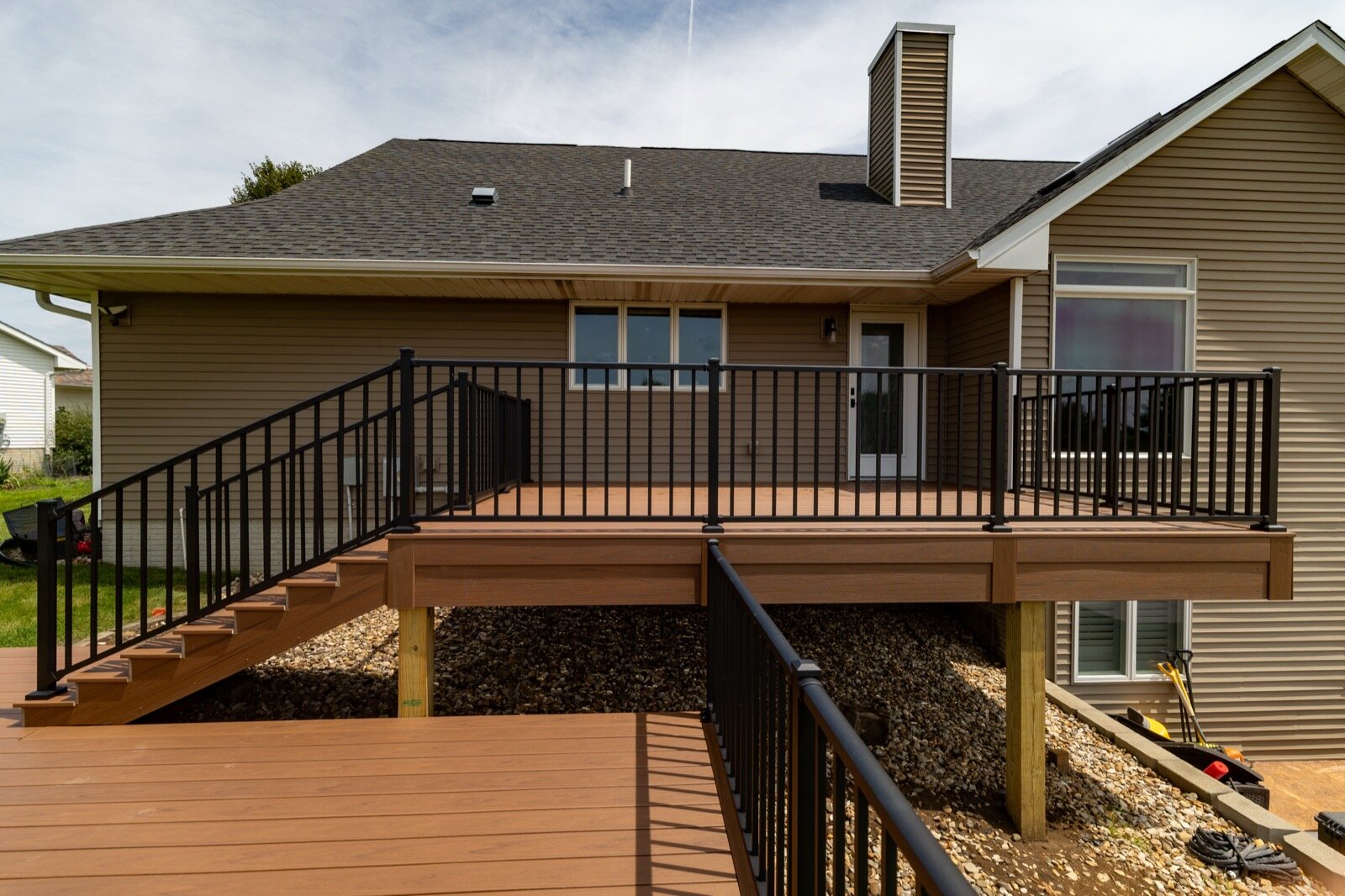 Custom composite deck in Marion Iowa by T&T Home Improvement